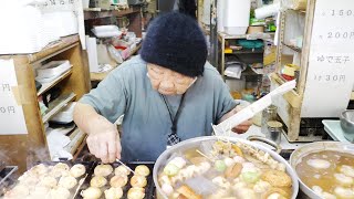 Takoyaki and Oden stalls in Osaka, Japan