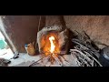 a nomadic woman’s craft in the cave preparing mountain pistachio juice on a rainy day