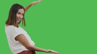 mixkit woman presenting something with chroma background 42635