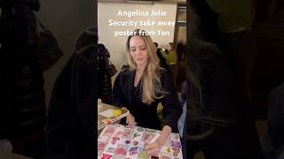 Ms Jolie! Aggressive fan gets poster taken away security says no autograph