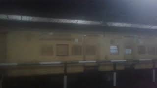 16606 NCJ - MAQ Ernad Express Entering station at Kollam Junction