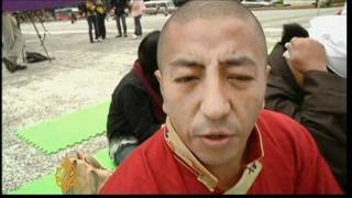 Thousands rally in support of Tibetan monks