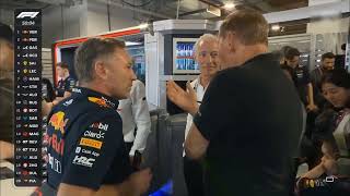 Elon Musk and Larry Ellison hanging out at Red bull garage