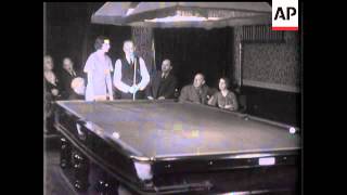 Lady Champion Gets Good Billiards Tip