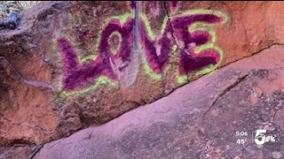 Vandals spray paint graffiti at Red Rocks Open Space