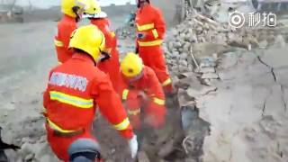 Xinjiang Firefighters Scour Rubble Following Earthquake