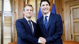 Justin Trudeau and Emmanuel Macron hold a joint news conference ahead of the G7 summit.