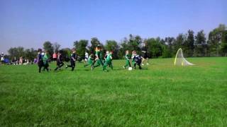 Joel's first soccer game. He was playing upfield!