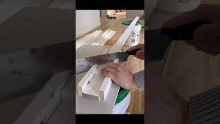 Cut a 45 degree angle with a hand saw