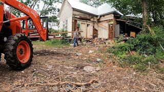 CLEANING UP DEBRIS FROM DEMOLISHED ROOM 140 YEAR OLD FARM HOUSE