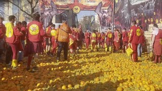 At the Carnival of Ivrea, thousands of people assemble for the famed "Battle of the Oranges."