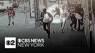 Surveillance video shows dozens running from Brooklyn shooting