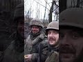 ukraine xx.11.2022. ukrainian soldier gives his friend a chocolate bar on his birthday. bakhmut.