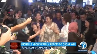 Michelle Yeoh's mother reacts to her Oscars win from a live viewing party in Malaysia