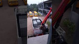 Truck attached crane | Unloading fly-ash bricks