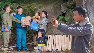 The local government gave gifts and warm clothes to the single mother and her two poor children