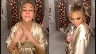 Jennifer Lopez's Wardrobe Malfunction As Robe Opens During Her Live