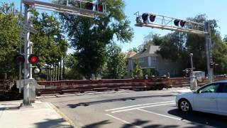 BNSF 7207 Baretable Train Northbound Through The N Street Railroad Crossing In Midtown Sacramento