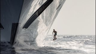 Surfing the wake of a 95m Yacht.