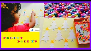 Thermocol Balls Christmas Tree Math activity for preschoolers. Number counting & matching with balls