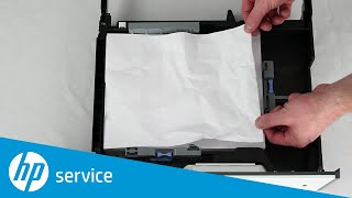 Clear a Paper Jam in the 3 x 500 Sheet Feeder | HP PageWide Enterprise Color 556 Printer | HP