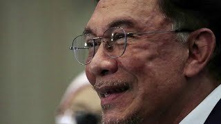 Malaysian prisoner turned leader claims majority