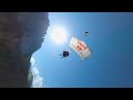 fpv drone wingsuit flying in the dolomites