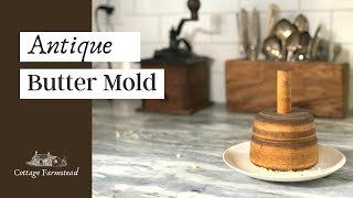 Can two millennials learn how to use an antique wood butter mold?