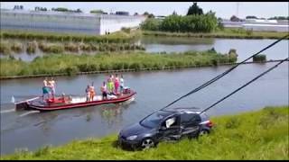 Berging auto te water Maasdijk