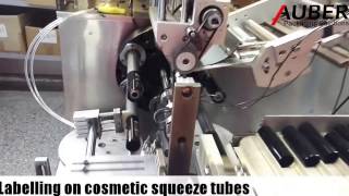 Auber labeling on cosmetic squeeze tubes