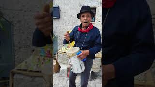 Man plays a cupa-cupa( Putipu)-Matera