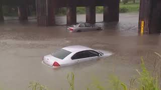 Cars flooded near Gentilly underpass