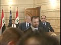 zapatazos contra bush en irak