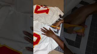 Cutting up a Kansas City Chiefs jersey 😈🏈