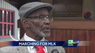 Dozens march to remember Martin Luther King Jr.