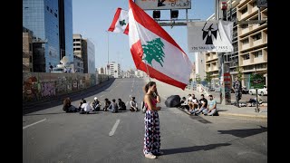 Lebanese protesters block roads in bid to oust political elite