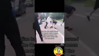 brave lady stops quran from burning with here bare hands MashAllah . Stop bruning HOLLY QURAN