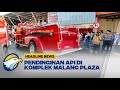 Damkar Melakukan Pendinginan Api di Komplek Malang Plaza