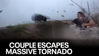 Couple dives into ditch to escape tornado