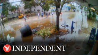 Residents wade through Gulfport streets as Hurricane Idalia makes landfall in Florida