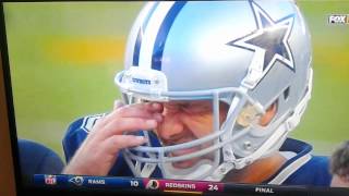 Tony Romo crying as he leaves the field