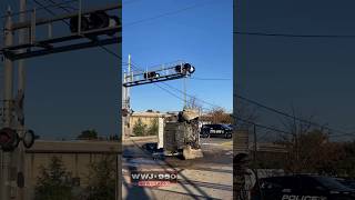 TRAIN CRASHES INTO GARBAGE TRUCK