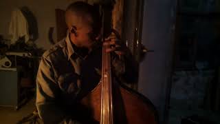 Herbie Tsoaeli playing his Double bass