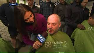 Firefighters shave heads to benefit children with cancer