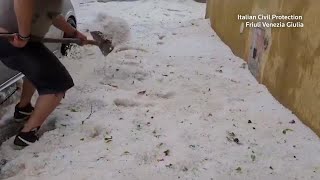 Ice-covered roads after hailstorm batters Italy