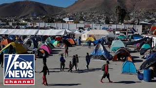 Tucker reacts to caravan migrants breaching US border