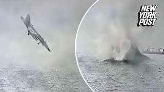 New footage shows moment military fighter jet crashes into San Diego Bay as pilots eject safely