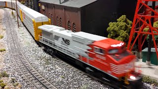 Lionel Legacy Red NS AC44C6CF #8520 pulling Autorack with mid DPU Conrail Heritage on CFMRR