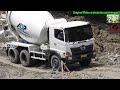 ready mix concrete mixer truck working on the steep site