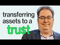 How are assets transferred to a trust?